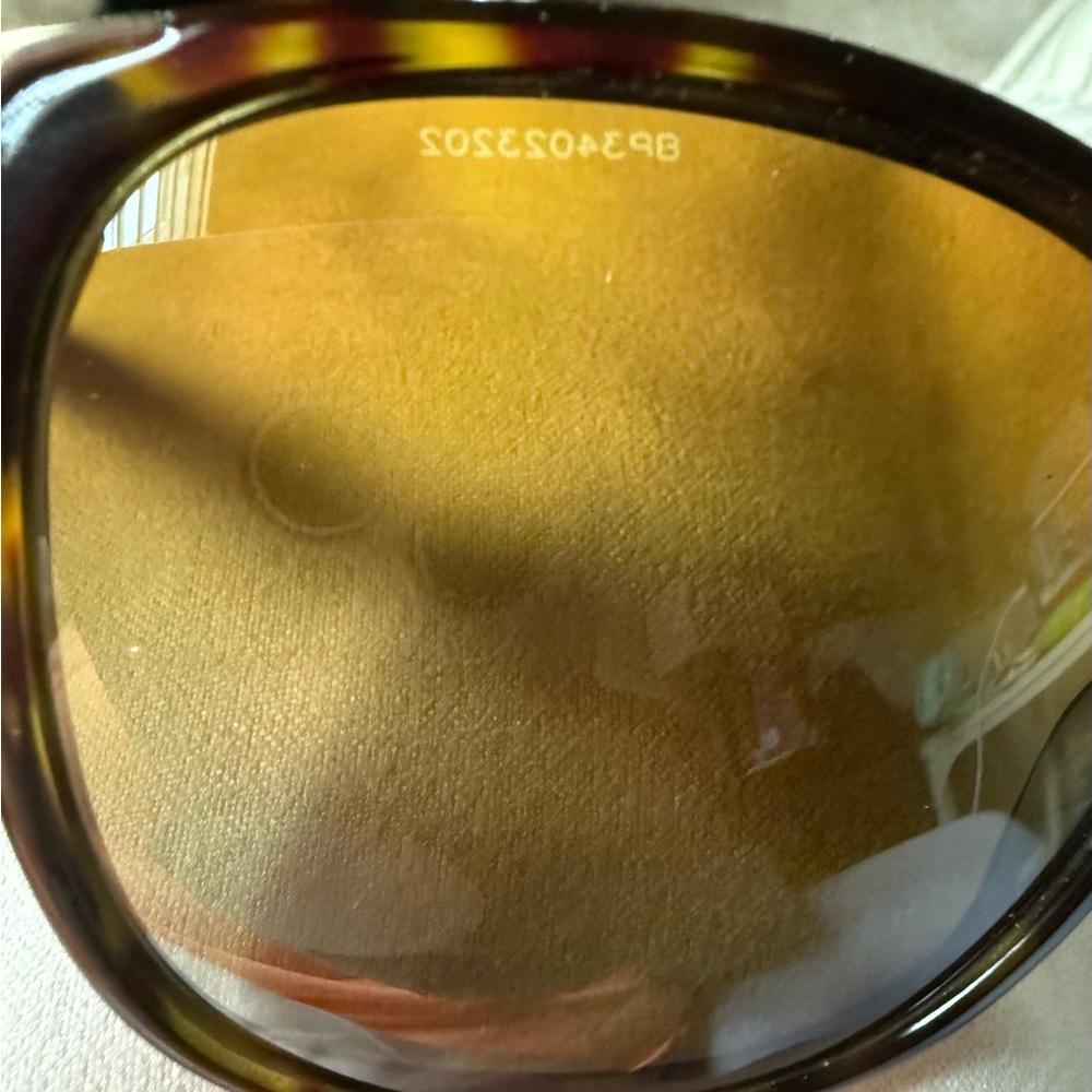 Prada Polarized Women’s Brown and Gold Sunglasses - Picture 11 of 12